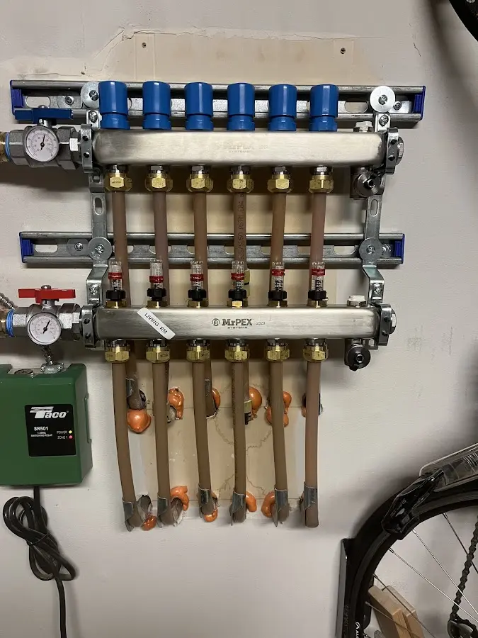 Plumber performing Gas Leak Detection at a residential property in West Earl